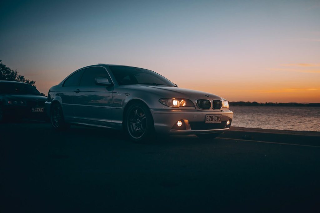 silver bmw e46 coupe at sunset